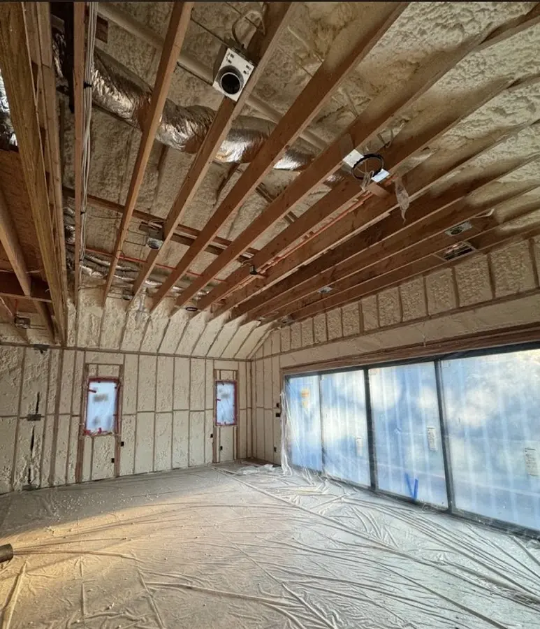 Interior walls and ceiling insulated with spray foam during new construction in Mayfield